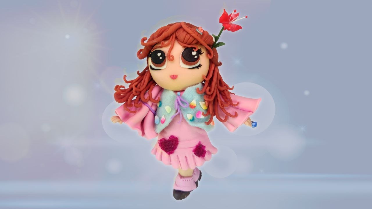 Personagem ruiva modelada em massinha